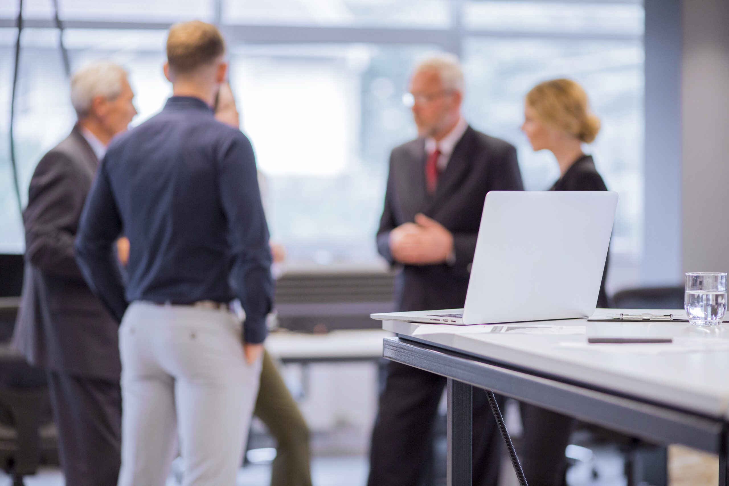 group business people standing front laptop table