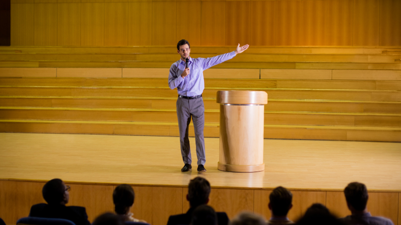 male business executive giving speech