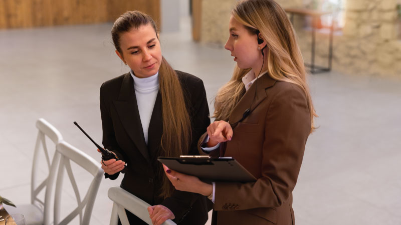 female wedding planner working ceremony