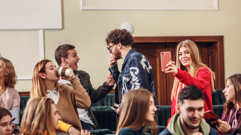 group cheerful happy students sitting lecture hall before lesson